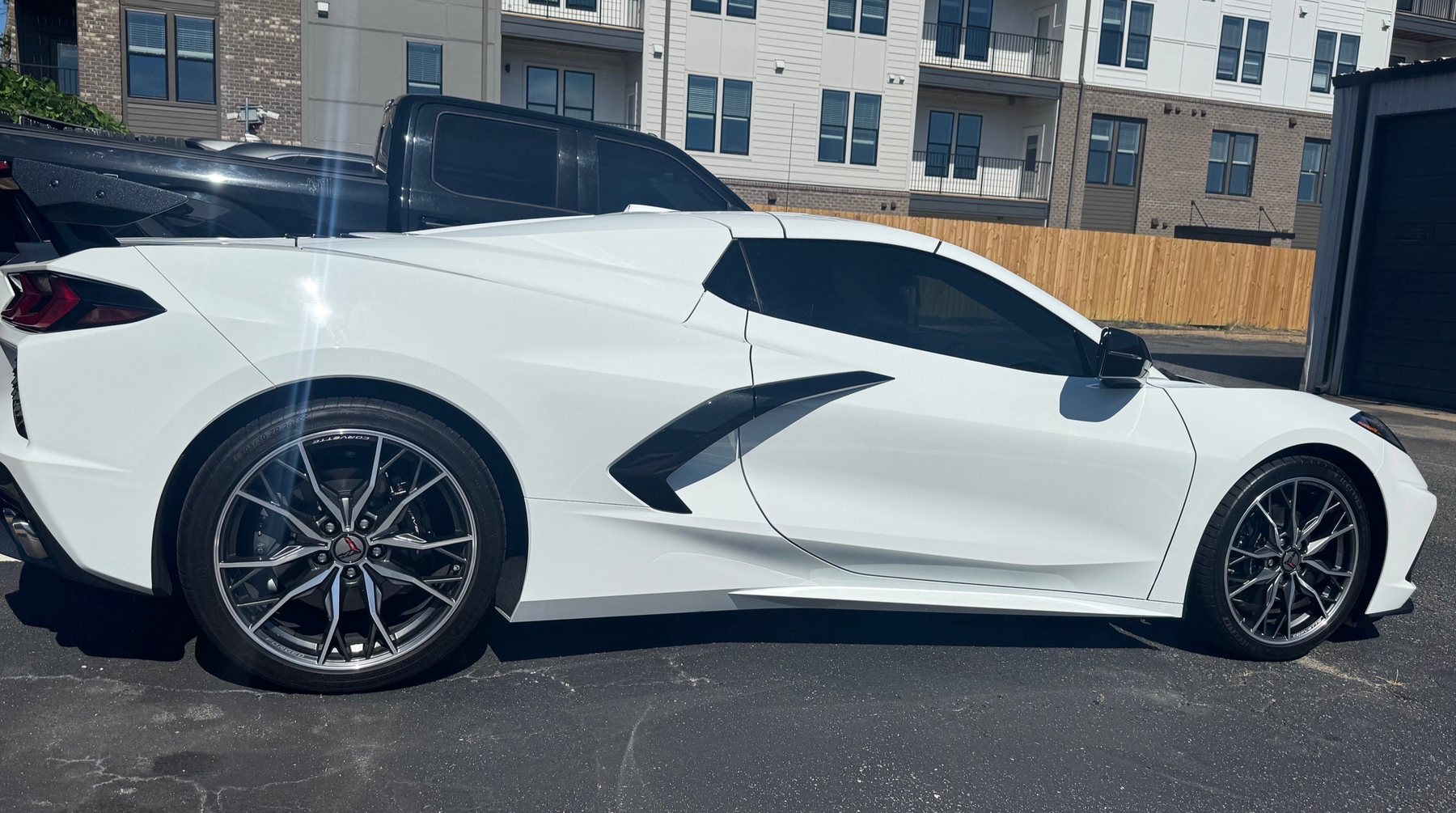 White Corvette convertible with tinted windows