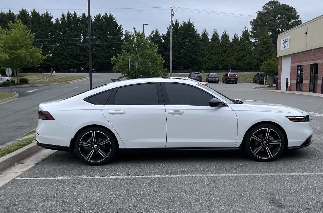 White Honda Accord with tinted windows