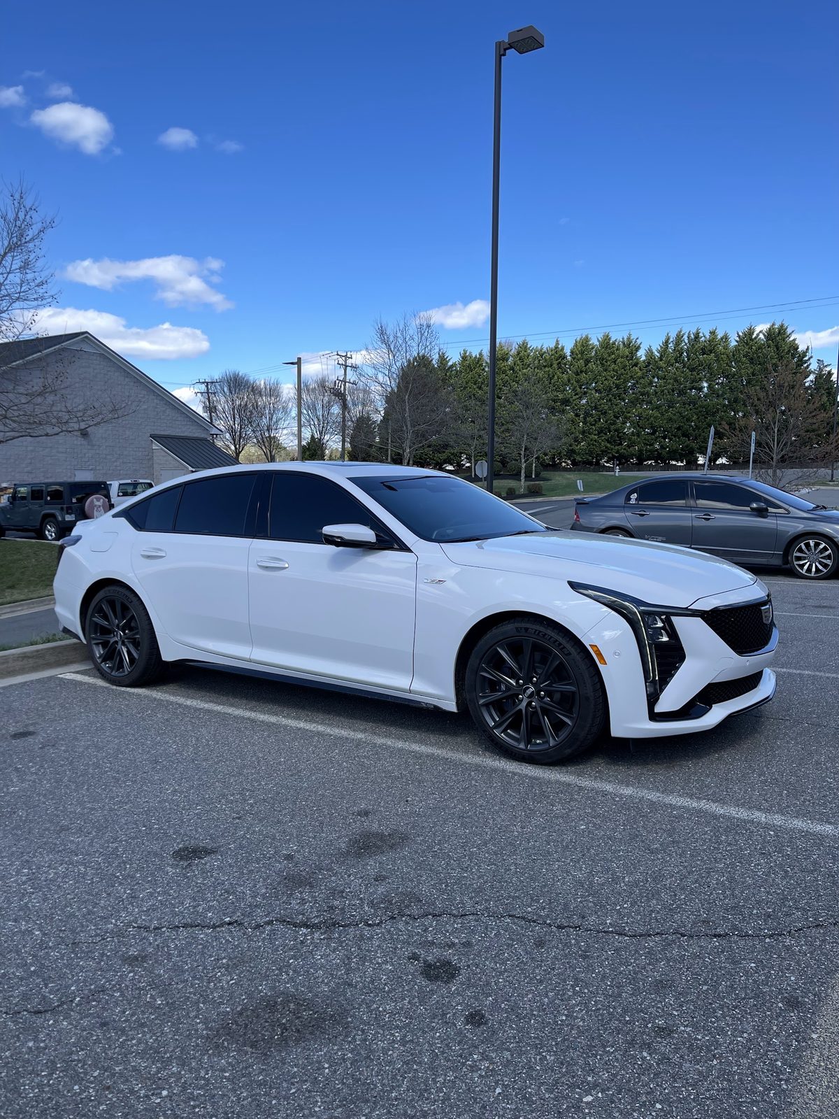 White Cadillac CT5 with tinted windows